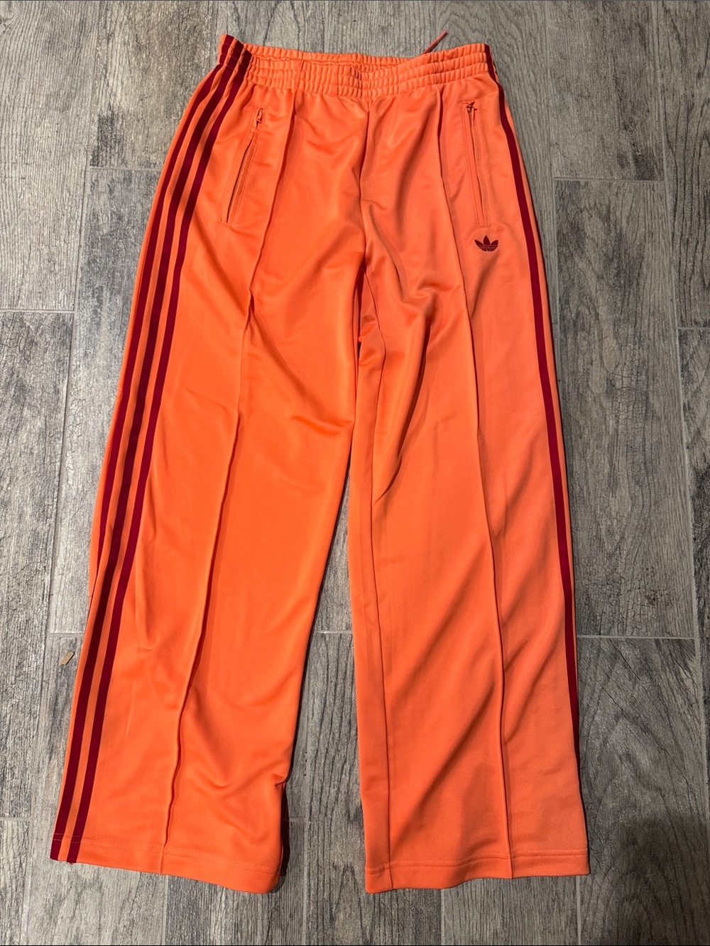 adidas Orange women’s Track Pants with Maroon Stripes